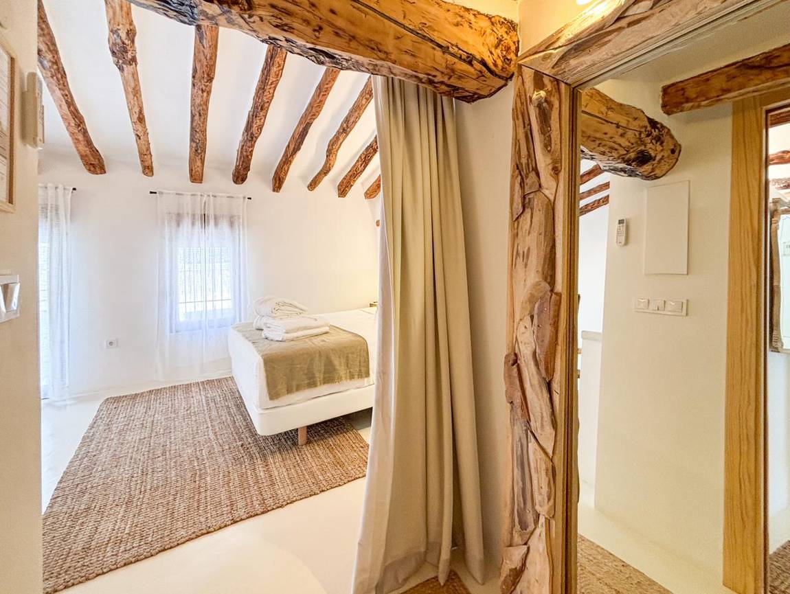 Dormitorio principal · la entrada